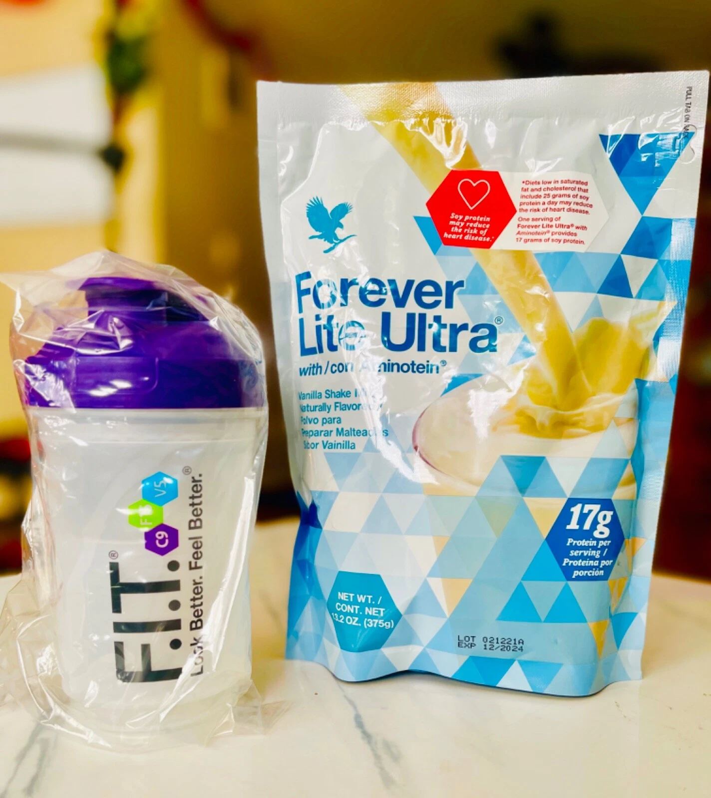 1 pouch of Forever Lite Ultra with Aminotein Vanilla Shak and shaker bottle