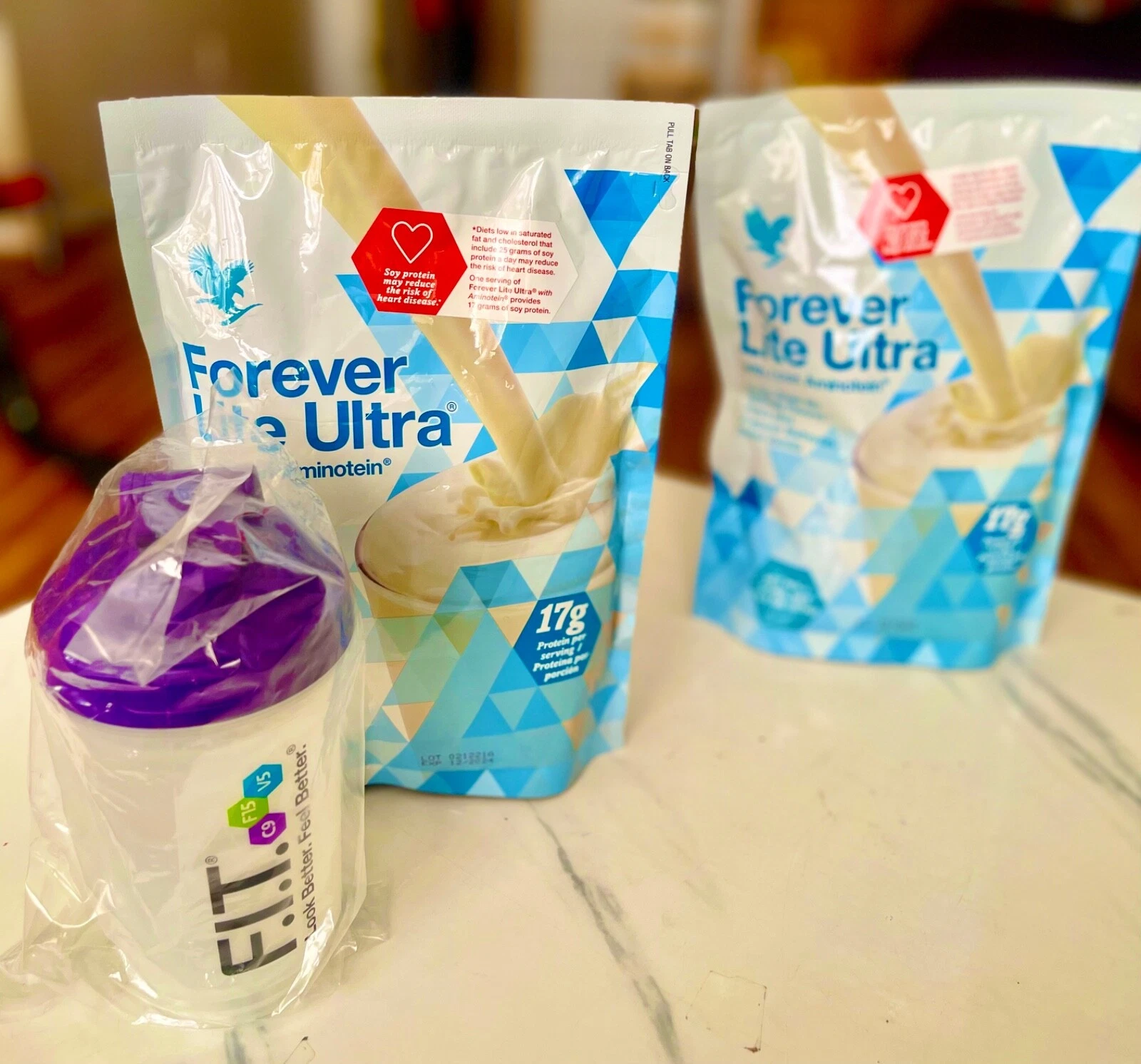 2x Forever Enhance Lite Ultra Shake Mixes with Amino Vanilla and shaker bottle